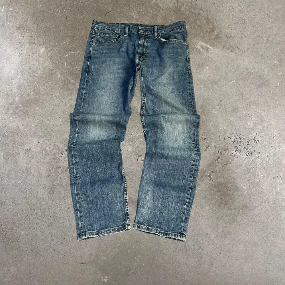 Levi's 502 Mid Wash Faded Denim Jeans